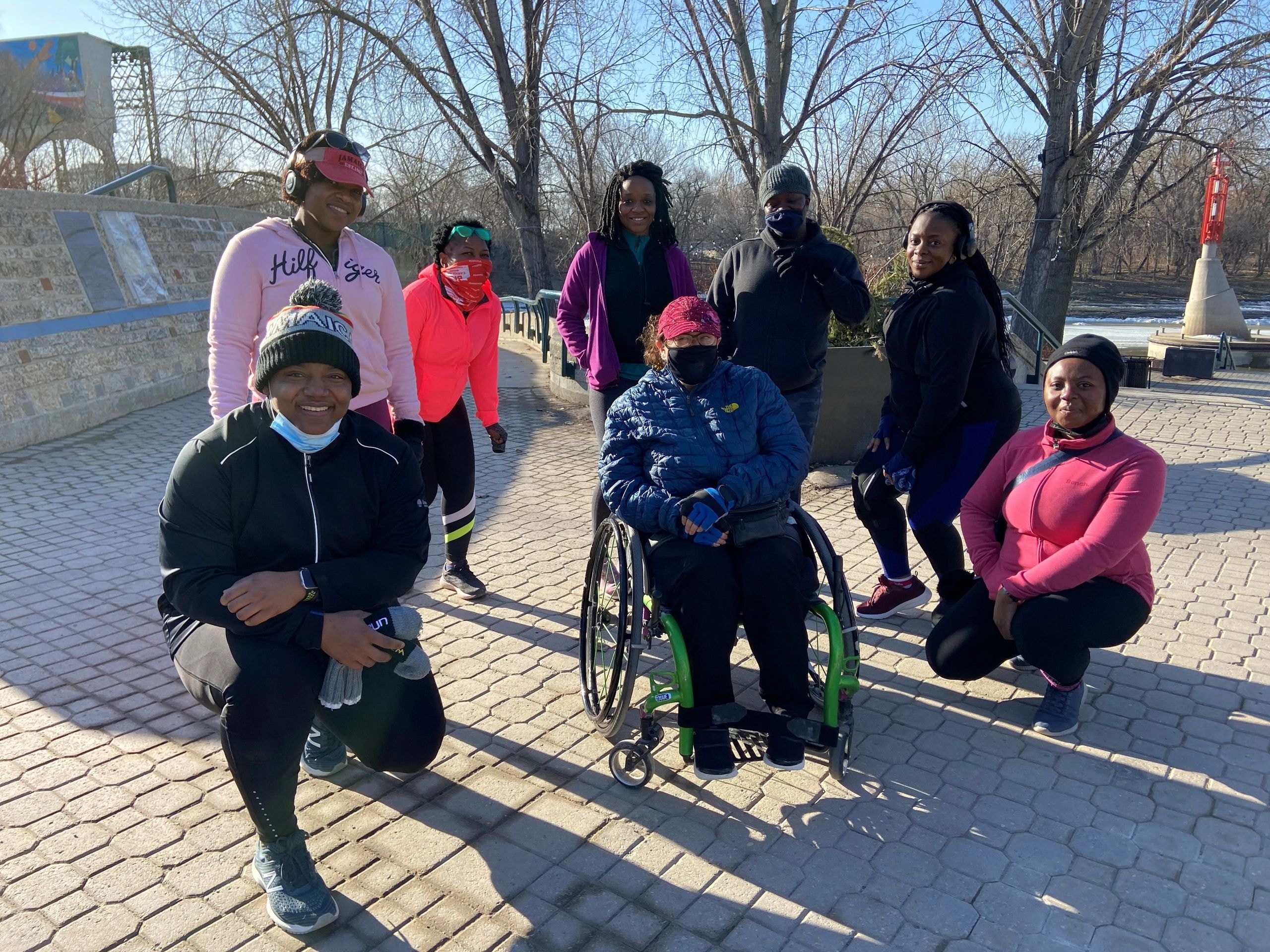 Inclusive Pegcity Steppers group gathered at a waterfront community event